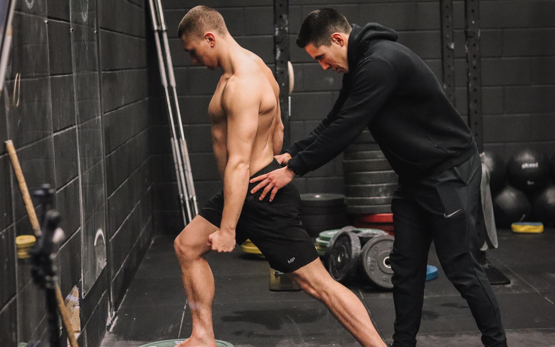 Coaching a movement in the gym